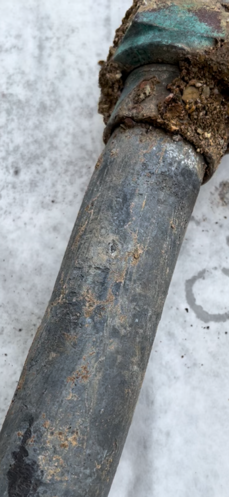 An image of a lead pipe, to illustrate an LCA blog that discusses removing lead service lines. 