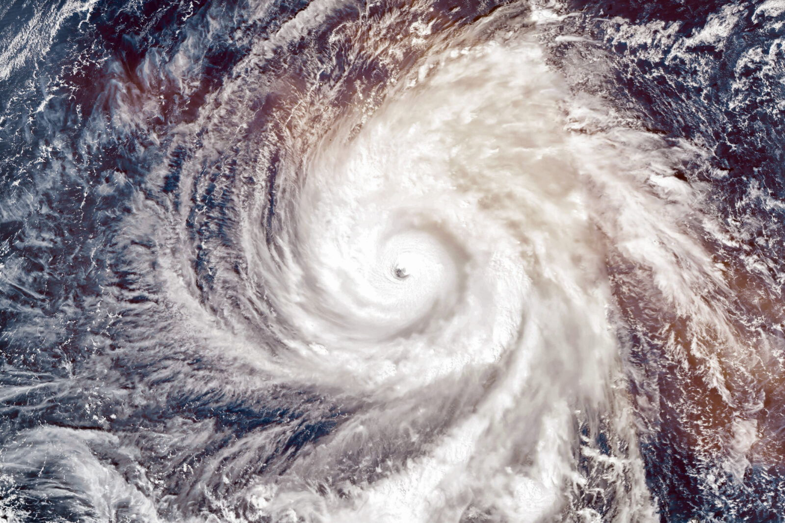 A satellite picture of a hurricane storm swirl, to illustrate an LCA blog on creating an emergency plan.